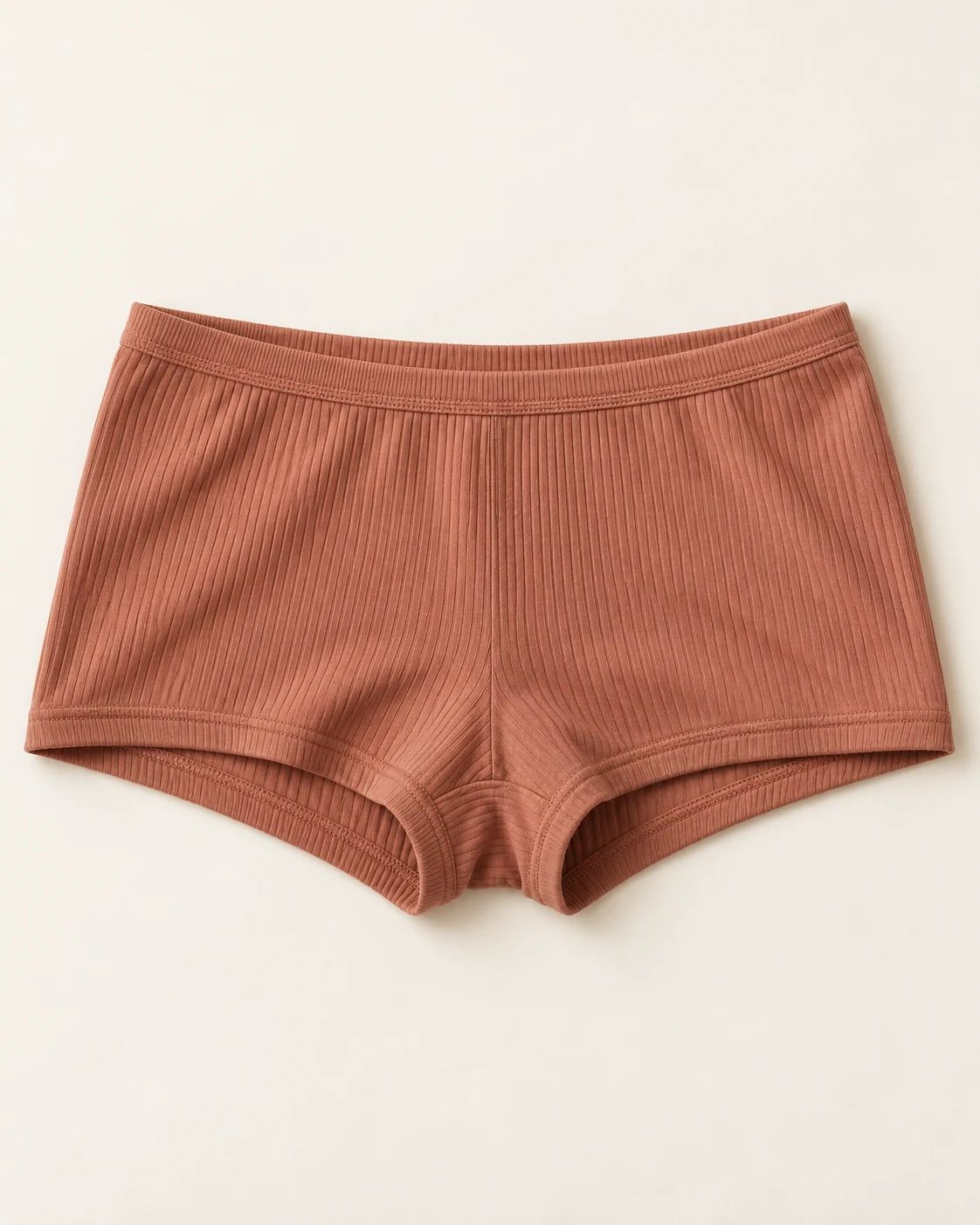 Clay ribbed soft shorts with a rectangular boyshort cut, short legs, and a soft waistband.